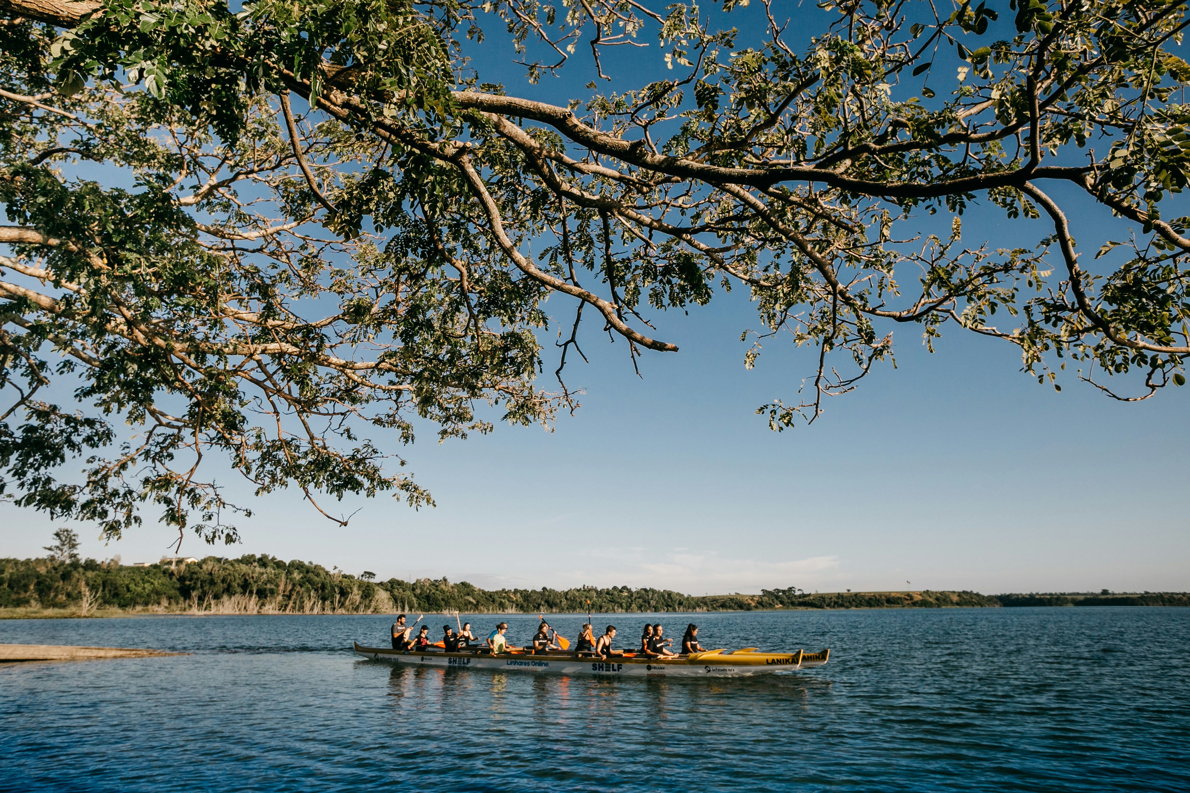 people riding on boat on sea during daytime